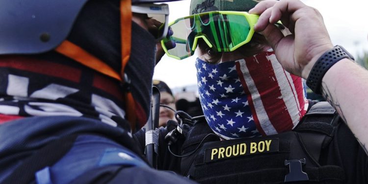 Hate groups migrate online, making tracking more difficult