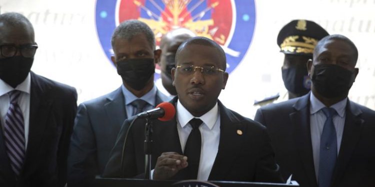 Official: Haiti’s interim prime minister to step down