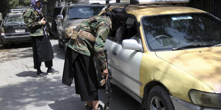 At-risk Afghans fearing Taliban hunker down, wait to leave