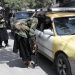 At-risk Afghans fearing Taliban hunker down, wait to leave