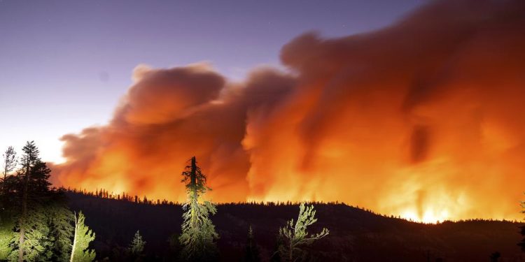 Lake Tahoe threatened by massive fire, more ordered to flee
