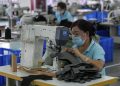 Official: China’s growth likely to slow due to virus, floods