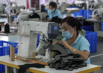 Official: China’s growth likely to slow due to virus, floods