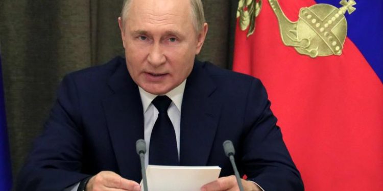Putin: Russia must build up defenses in view of NATO moves