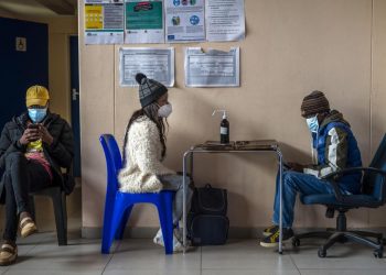 South Africans urge jabs as president ill in omicron wave