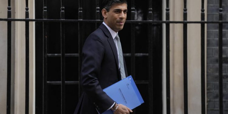 UK Treasury chief fights to save reputation in tax storm