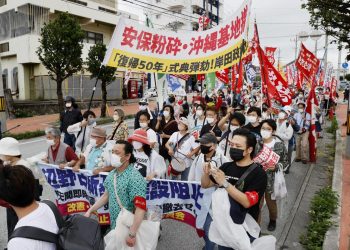 Okinawa marks 50 years of end to US rule amid protests