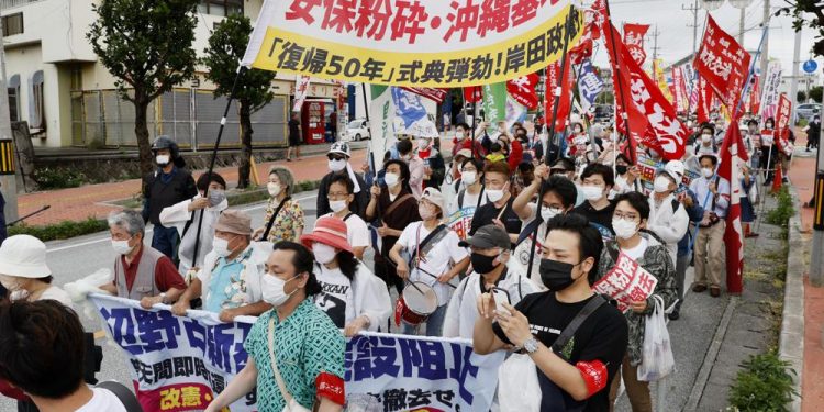 Okinawa marks 50 years of end to US rule amid protests