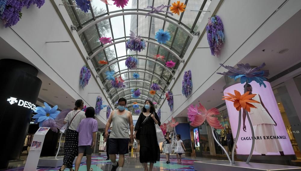 Beijing, Shanghai ease COVID restrictions as outbreaks fade