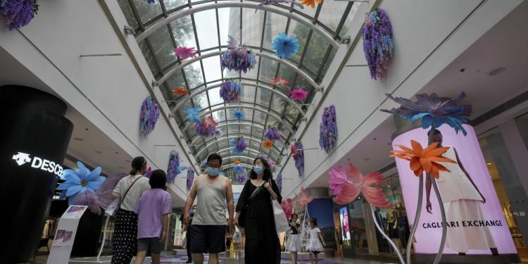 Beijing, Shanghai ease COVID restrictions as outbreaks fade