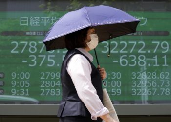 Asian shares mixed after rate jitters tumble on Wall Street