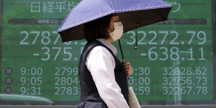 Asian shares mixed after rate jitters tumble on Wall Street