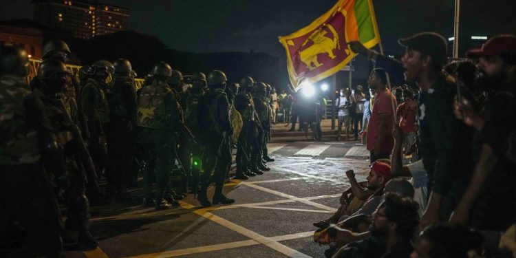 Sri Lankan troops forcefully clear protesters; new PM named