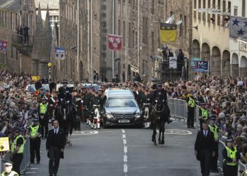 King Charles III and his siblings escort queen’s coffin