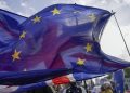 As British voters cool on Brexit, UK softens tone towards EU