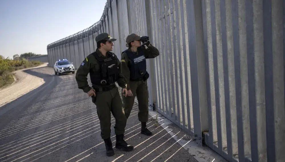 Greece expanding border wall, calls for EU help on migration