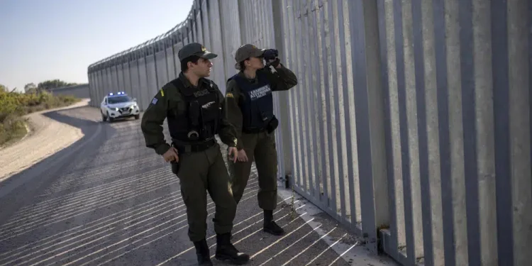 Greece expanding border wall, calls for EU help on migration