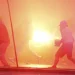 Peru’s protest ‘deactivators’ run toward tear gas to stop it
