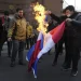 Amid unrest, Iran’s hardliners turn their anger to France