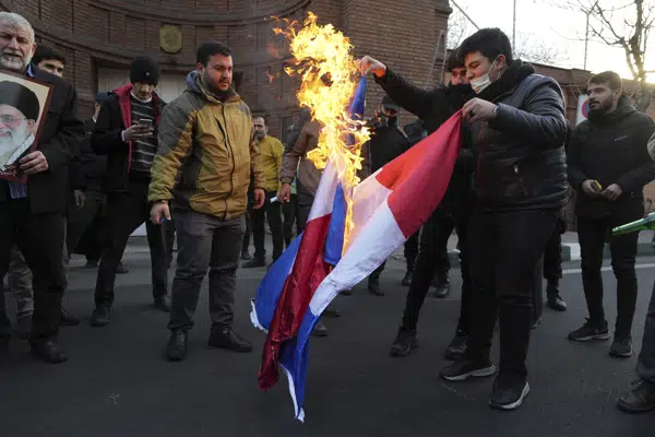 Amid unrest, Iran’s hardliners turn their anger to France