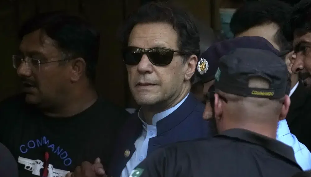 Pakistan’s former Prime Minister Imran Khan leaves high court after getting protection from arrest