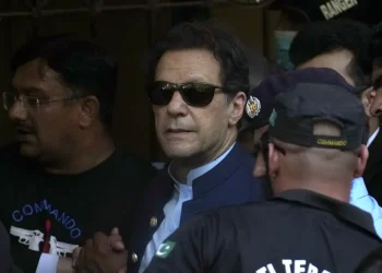 Pakistan’s former Prime Minister Imran Khan leaves high court after getting protection from arrest