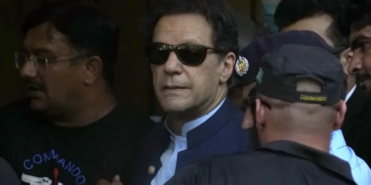 Pakistan’s former Prime Minister Imran Khan leaves high court after getting protection from arrest