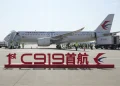 China’s 1st domestically made passenger plane completes maiden commercial flight