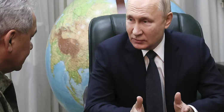 Putin and top military leaders visit southern military headquarters to assess his war in Ukraine