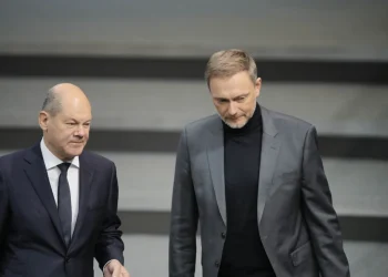 Germany’s leader vows to fix a spending crisis that’s worsening gloom in the struggling economy