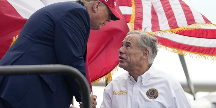 Trump picks up the endorsement of Texas Gov. Greg Abbott during a visit to a US-Mexico border town