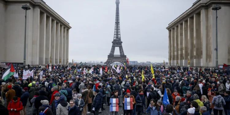 French protesters ask Macron not to sign off on an immigration law with a far-right footprint