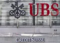 Swiss bank UBS reports pretax loss in 4Q, plans share buybacks after Credit Suisse deal wraps up