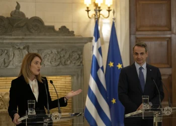 Despite mounting criticism, Greece’s prime minister defends record on rule of law