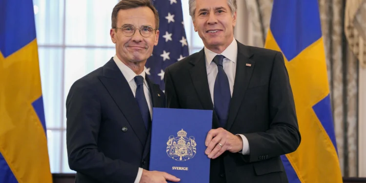Sweden officially joins NATO, ending decades of post-World War II neutrality