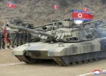North Korea’s Kim test drives a new tank and orders troops to prepare for war