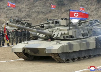 North Korea’s Kim test drives a new tank and orders troops to prepare for war
