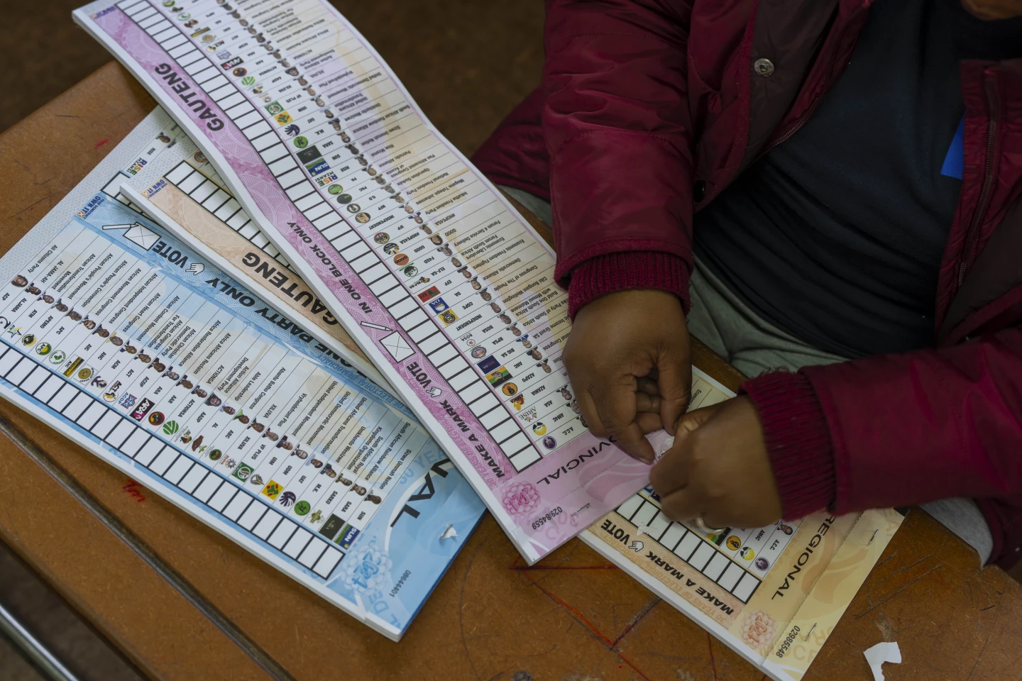 South Africans vote in a pivotal election as president says he has no doubt his ANC party will win