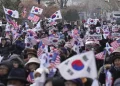 Top aide of impeached South Korean president pleads for investigators to halt detention efforts
