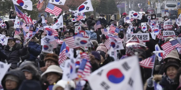 Top aide of impeached South Korean president pleads for investigators to halt detention efforts