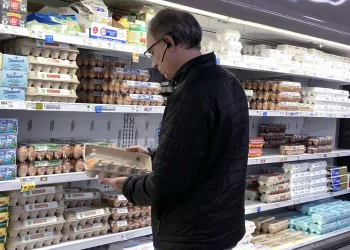 US inflation cooled last month, though trade war threatens to lift prices