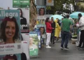 Australians start voting in general elections as pope’s death overshadows campaigning